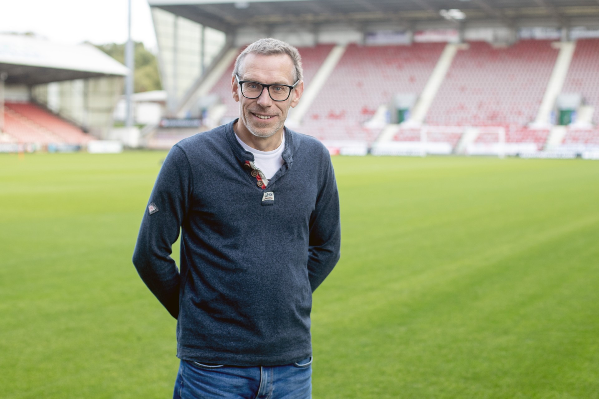 Gordon Milne in the stadium smiling